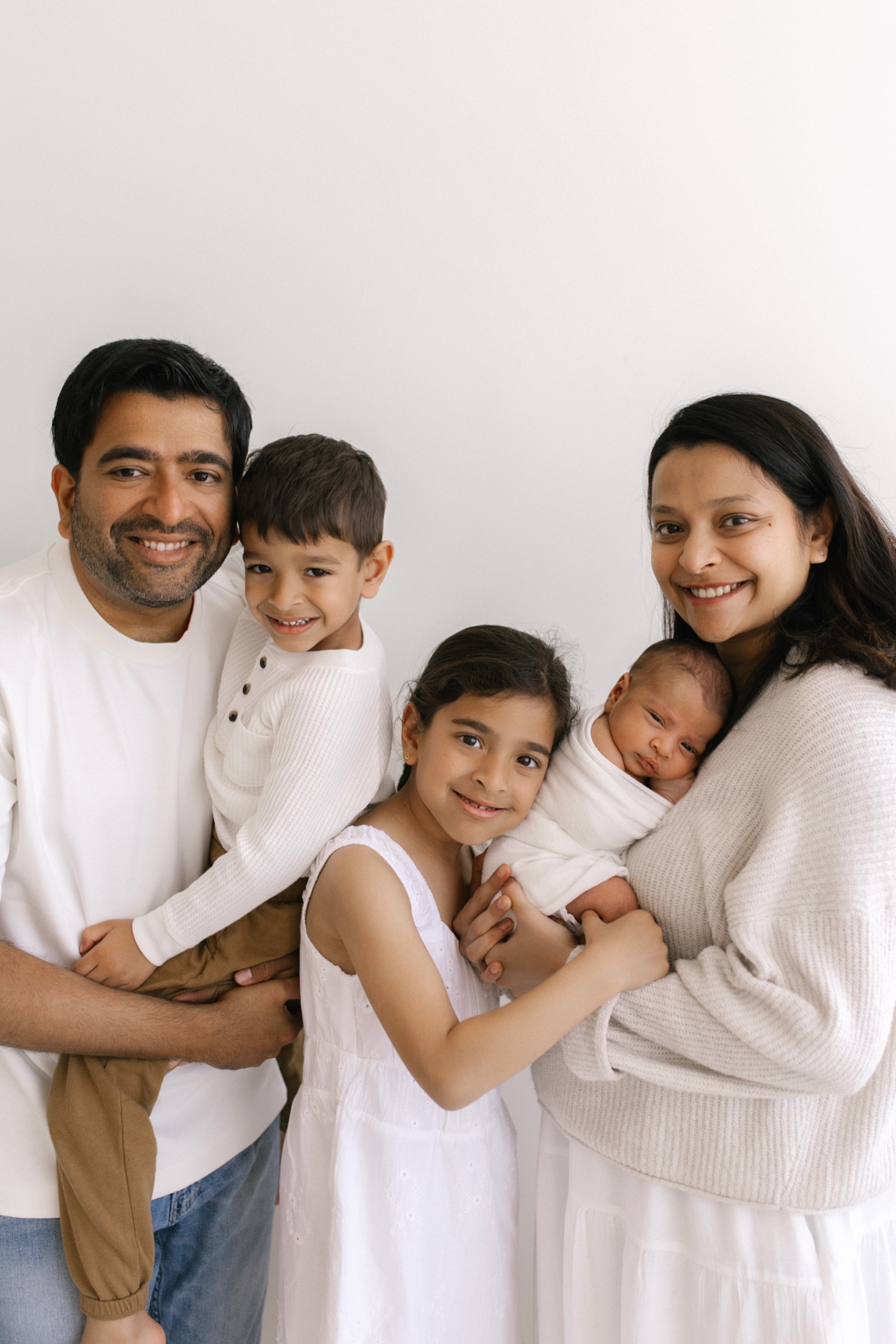 Swetha and Sundaram with their three children